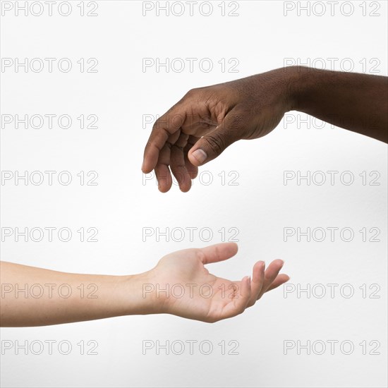 Multiracial hands coming together. Resolution and high quality beautiful photo