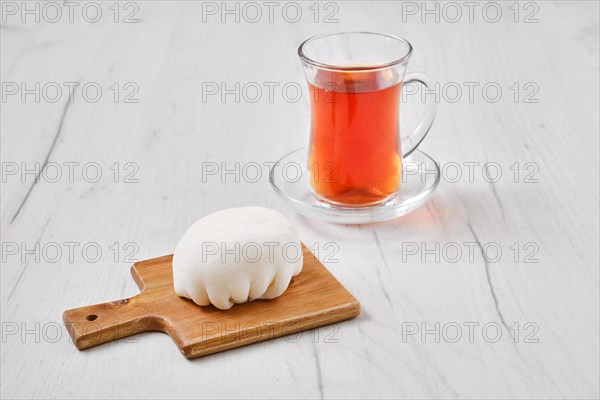 Sweet dessert mochi with coconut chips with fruit tea