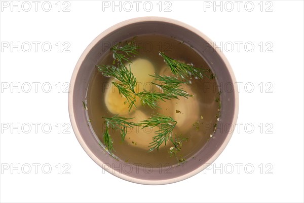 Chicken bouillon with egg isolated on white background