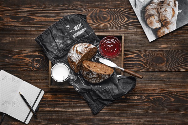 Fresh rye brown bread on wooden cutting board