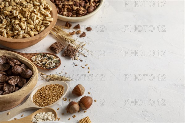 High angle bowls with assortment breakfast cereals copy space