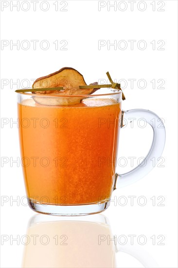 Glass of hot pear drink isolated on white background