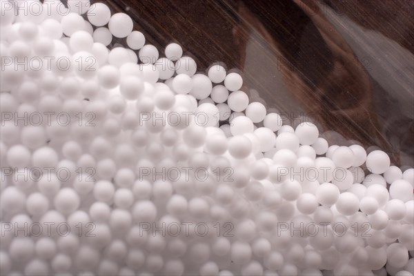 White little polystyrene foam balls as background