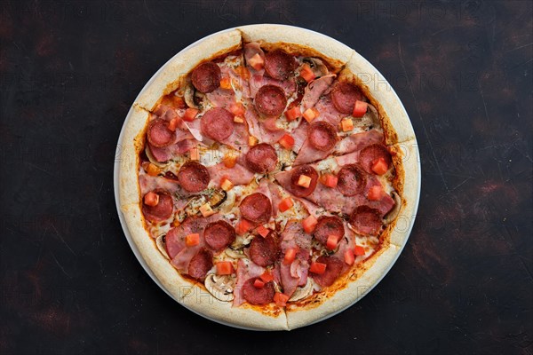 Top view of pizza with ham