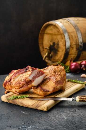 Air dried pork meat on wooden cutting board