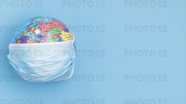 Top view globe wearing medical mask with copy space. Resolution and high quality beautiful photo