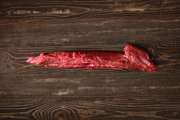Overhead view of raw fresh top round beef strip