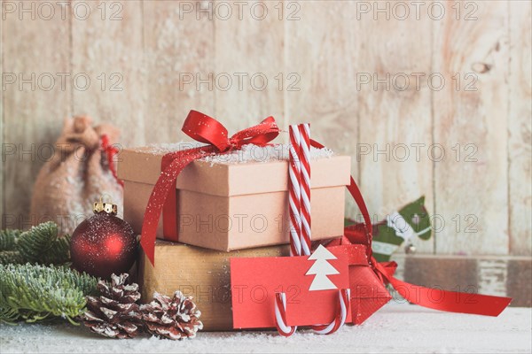 Candy canes with red envelopes gifts