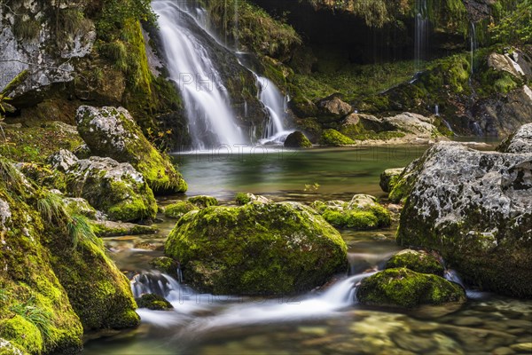 Slap Virje waterfall with mossy rocks
