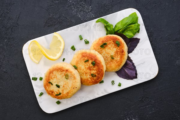 Top view of fried cod meat cutlet