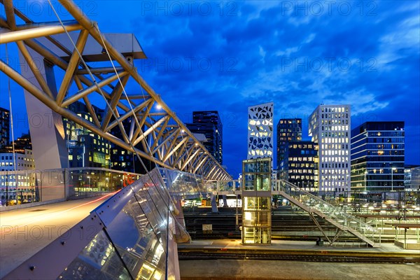 Oslo skyline modern city architecture building with bridge in Barcode District at night in Oslo