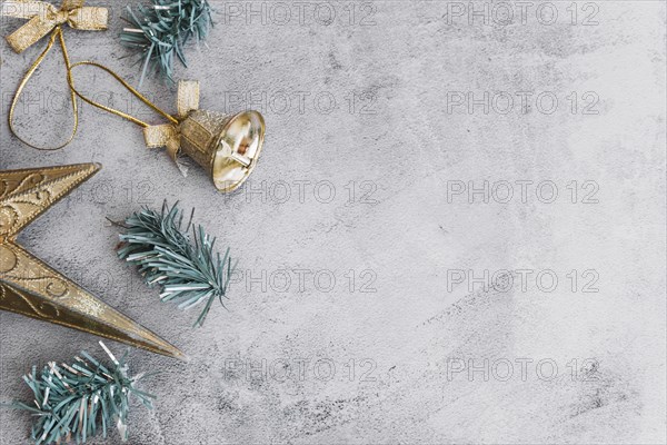 Christmas composition small metallic bell with branches