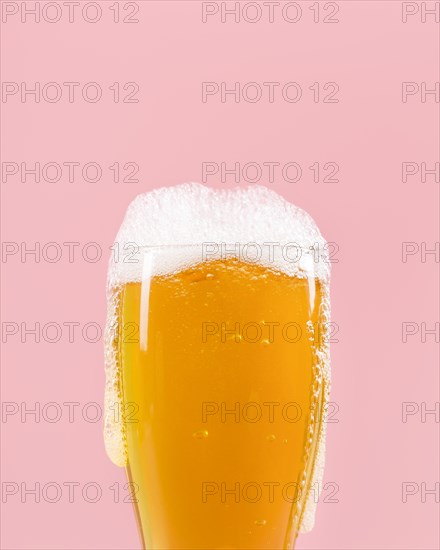 Glass with beer having foam