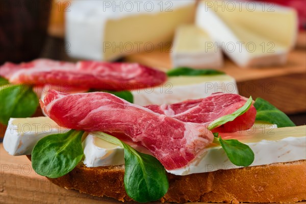 Sandwich with camembert cheese and smoked bacon