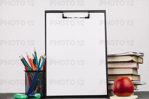 School supplies around easel