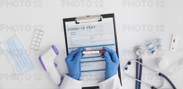 Top view doctor checking covid test. Resolution and high quality beautiful photo