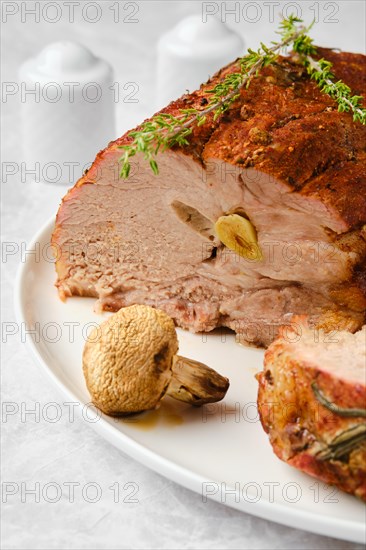 Pork neck baked in oven and cit on slice closeup