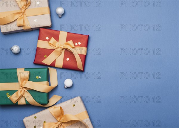Colorful presents with ribbon blue background
