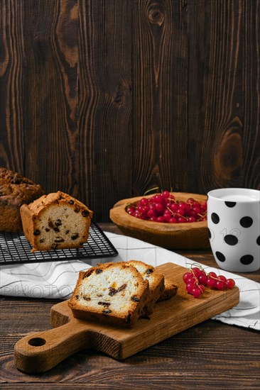 Fresh biscuit cake with raisins on the table