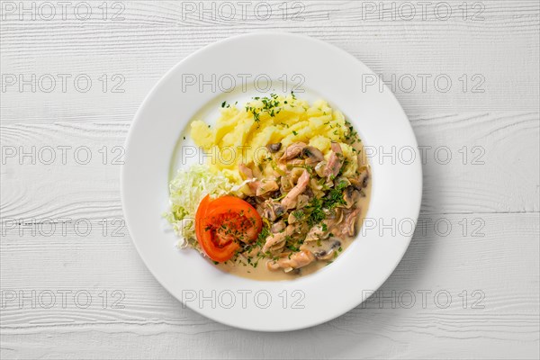 Top view of plate with chicken goulash