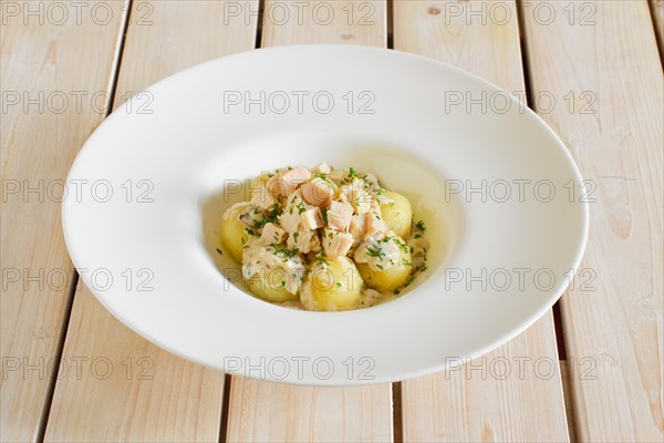 Potato dumplings with boiled chicken meat