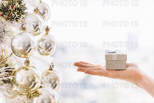 Woman holding small gift box hand. Resolution and high quality beautiful photo