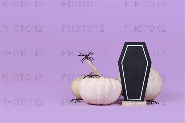 Halloween arrangement with coffin shaped chalkboard