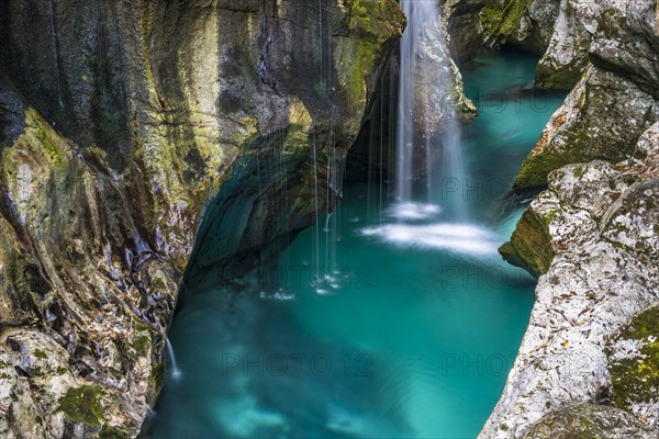 Mountain river Soca flows through narrow canyon