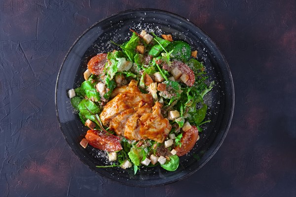 Fried turkey fillet with arugula