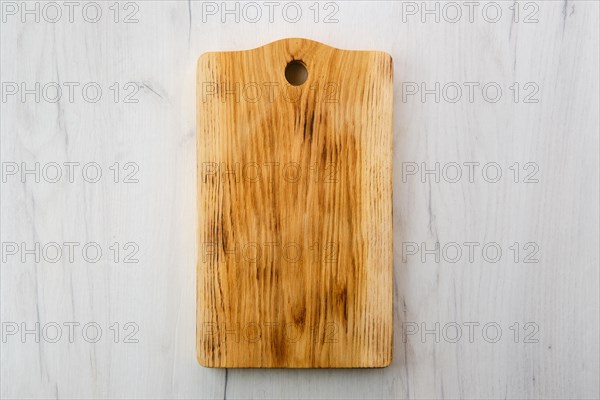 Overhead view of wooden cutting board