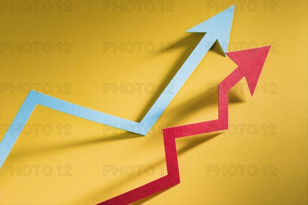 Paper arrow indicating economy growth