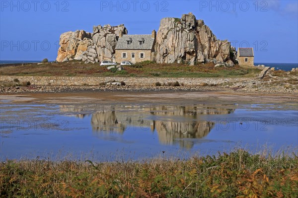 Country house between rocks near Le Gouffre