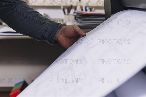 Crop hand printing blueprints