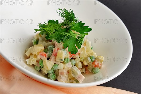 Traditional russian salad olivier