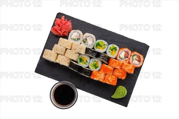 Big set of rolls with traditional garnish isoalted on white background