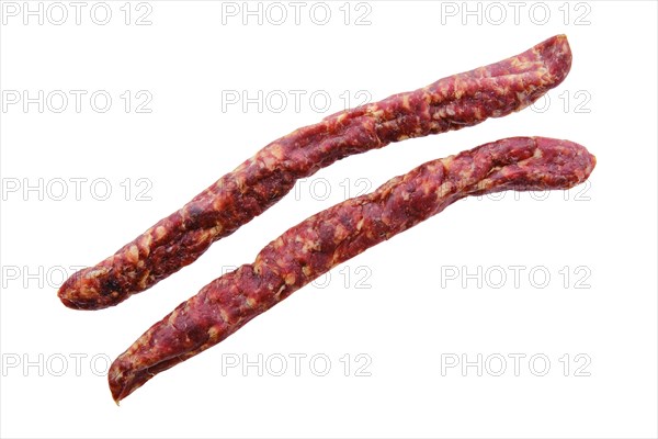 Top view of sun-dried pork sausage isolated on white background