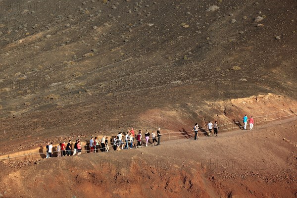 Hiking trail across the extinct volcanic crater to the lagoon of El Golfo