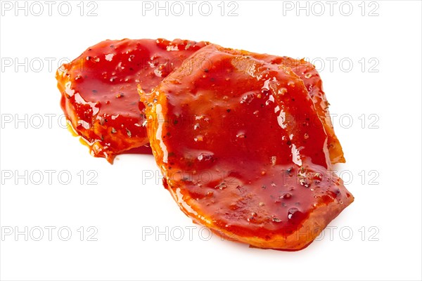 Raw piece of meat with spice and sauce prepered for barbecue. Gastronomy template isolated on white background