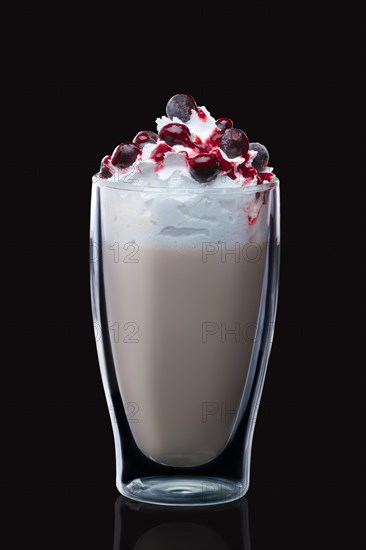 Double-walled glass with coffee cocktail isolated on black. Photo with clipping path