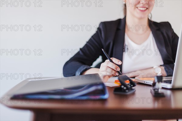 Cheerful office working woman workplace