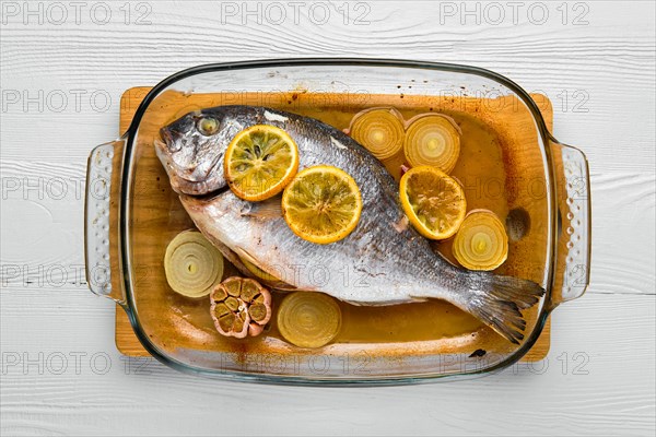 Overhead view of gilt head bream baked in oven