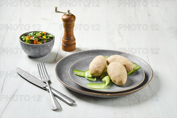 Semifinished frozen cepelinai. Potato dumplings stuffed with ground meat