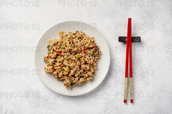 Top view rice with vegetables plate chopsticks. Resolution and high quality beautiful photo