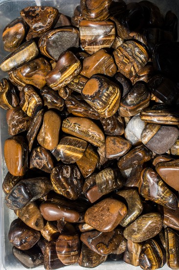 Tiger's eye and hawk's eye gemstone as natural mineral rock specimen