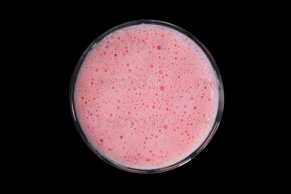 Top view of glass of smoothies isolated on black