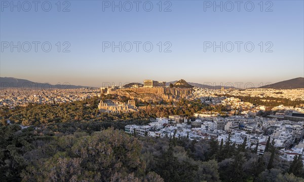 View from Philopappos Hill over the city at sunset