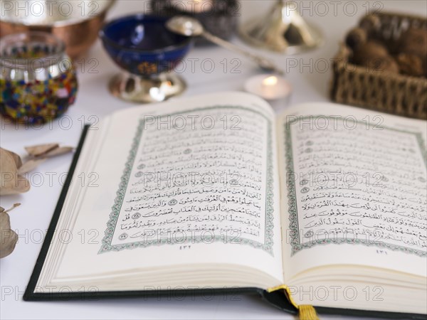 Close up opened quran table