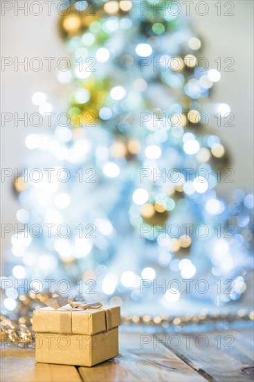 Present box near christmas tree