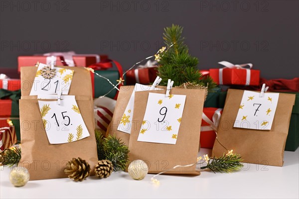 Homemade Advent calendar made from craft paper bags with handwritten numbers