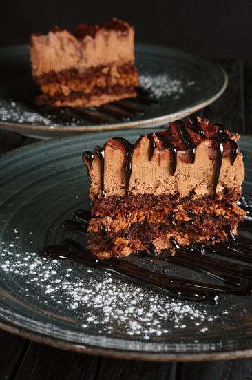 Two pieces of puffy chocolate cake with souffle